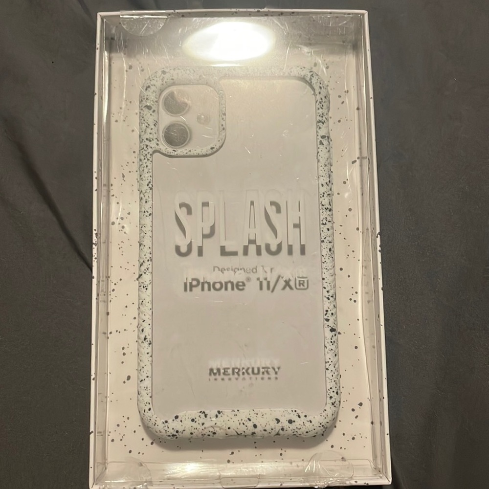 Is a Splash iPhone 11 phone case. Speckled Duo Layer Case